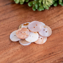 Load image into Gallery viewer, Abalone Shell Bottons on a wooden surface high angle - Down to Earth