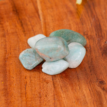 Load image into Gallery viewer, Amazonite Tumbled on a wooden surface front angle - Down to Earth