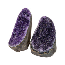 Load image into Gallery viewer, "Two deep purple Amethyst Geode Clusters on a white background," - Down to Earth.