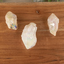 Load image into Gallery viewer, Three Angel Aura Qaurtz Points top down on a style background - Down To Earth