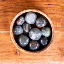 Load image into Gallery viewer, Bloodstone Tumbled 1lb top down in a bowl displayed on a styled background - Down To Earth