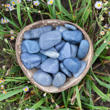 Load image into Gallery viewer, Tumbled Blue Quartz Crystals in a styled photo - Down To Earth