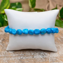 Load image into Gallery viewer, Blue Howlite Tumbled Stone Bracelet on White Pillow Styled Photo - Down To Earth