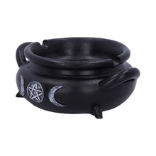 Load image into Gallery viewer, Black resin cauldron shaped ashtray and incense burner with white triple moon design skewed view - Down to Earth