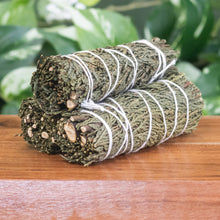Load image into Gallery viewer, Cedar Smudge Stick angled group photo displayed on a styled background - Down To Earth