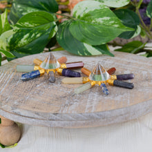 Load image into Gallery viewer, Chakra Gem & Crystal Generator on a wooden surface - Down to Earth
