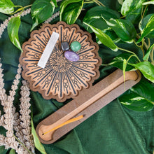 Load image into Gallery viewer, "Top-down view of a Crystal Grid Incense Holder on a green cloth with foliage around the product," - Down to Earth.