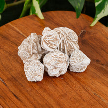 Load image into Gallery viewer, Desert Rose on a wooden surface - Down to Earth