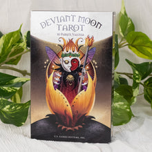Load image into Gallery viewer, Deviant Moon Tarot Deck Frontside of the box on a style background - Down To Earth
