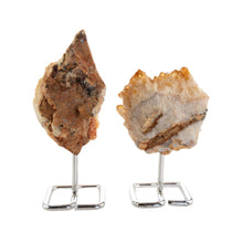 Load image into Gallery viewer, "Backside of two natural Druze Citrine raw crystals on a silver stand on top of a white background," - Down to Earth.
