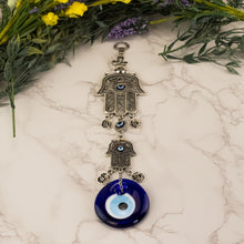 Load image into Gallery viewer, Evil Eye Hamsa Hand Protection on a style background - Down To Earth