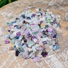 Load image into Gallery viewer, Fluorite Crystal Chips on a wooden surface styled photo - Down to Earth