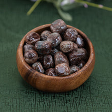 Load image into Gallery viewer, Tumbled Garnet in a bowl on a green cloth - Down To Earth