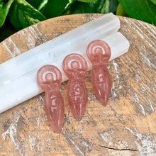 Load image into Gallery viewer, "Three Crystal Goddess Statues in the variation Strawberry Quartz leaning on Selenite wands," - Down to Earth.