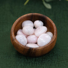 Load image into Gallery viewer, Mangano Calcite in a wooden bowl on a green cloth - Down to Earth