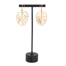 Load image into Gallery viewer, Monstera Leaf Earrings on a jewelry stand displayed on a white background - Down to Earth