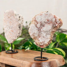 Load image into Gallery viewer, Pink Amethyst on Stand on a wooden surface - Down to Earth