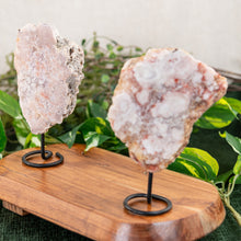 Load image into Gallery viewer, Pink Amethyst on Stand on a wooden surface back focus - Down to Earth