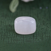 Load image into Gallery viewer, Pink Calcite closeup on a green cloth - Down to Earth