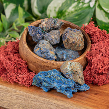 Load image into Gallery viewer, Azurite Raw displayed on a wooden surface with a colorful background - Down to Earth