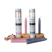 Load image into Gallery viewer, "Professional photo showcasing two bath ritual kits from Down to Earth. Each kit includes four chime candles, a wooden candle holder, and 100 grams of bath salts." - Down to Earth.