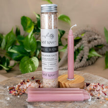 Load image into Gallery viewer, "Styled photograph of a Self Love Ritual Bath Kit. This kit includes four pink chime candles, a chime candle holder and 100mg of bath salts." - Down to Earth.