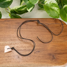 Load image into Gallery viewer, Rose Quartz Leather Necklace Top down up close on a style background - Down To Earth