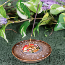 Load image into Gallery viewer, Round Mushroom Incense Burner on a green cloth burning an incense styled photo - Down to Earth