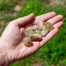 Load image into Gallery viewer, Rutilated Quartz Tumbled in Palm of a Hand - Down To Earth Quartz Healing Crystals
