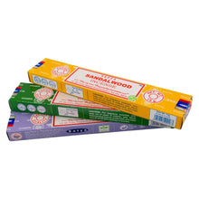 Load image into Gallery viewer, "Three boxes of Satya incense on a white background," - Down to Earth.