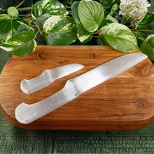 Load image into Gallery viewer, Selenite Knife group photo top down displayed on a styled background - Down To Earth