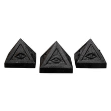 Load image into Gallery viewer, Three shungite black triangular blocks with evil eye symbol on a white background - Down To Earth