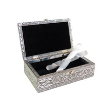 Load image into Gallery viewer, "Open Silver OM Box with two selenite spiral wands within on a white background," - Down to Earth.