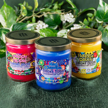 Load image into Gallery viewer, Smoke Odor Exterminator Candle group photo displayed on a styled background - Down to Earth