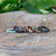 Load image into Gallery viewer, Crystal Energy Stretch Ring group picture - Down to Earth