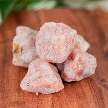 Load image into Gallery viewer, Sunstone Raw on a wooden surface high angle - Down to Earth