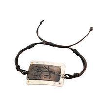 Load image into Gallery viewer, "Bracelet with a tree alloy pendant on an adjustable cord with a white background," - Down to Earth.