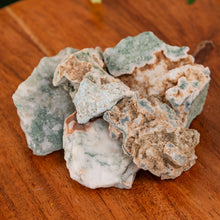 Load image into Gallery viewer, Tree Agate Raw on a wooden surface close up - Down to Earth