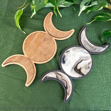 Load image into Gallery viewer, "Wooden and marble-patterned moon phase wall hangers on a green textured surface with leaves," - Down to Earth.