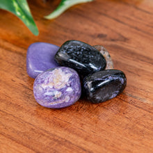 Load image into Gallery viewer, Charoite Tumbled on a wooden surface high angle - Down to Earth