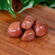Load image into Gallery viewer, Red Goldstone Tumbled on a wooden surface high angle - Down to Earth