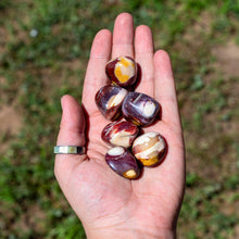 Load image into Gallery viewer, Tumbled Mookaite in a the Palm of a Hand - Down To Earth