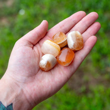Load image into Gallery viewer, Tumbled Orange Calcite in the Palm of a  Hand - Down To Earth