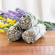 Load image into Gallery viewer, White Sage with Rosemary Smudge Stick group photo on a style background - Down To Earth