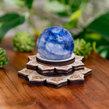 Load image into Gallery viewer, Wooden Crystal Holder with sphere on a wooden surface low angle - Down to Earth