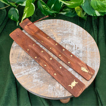 Load image into Gallery viewer, "Two Wooden Incense Burners that are 10'' and have golden embellishment designs," - Down to Earth.