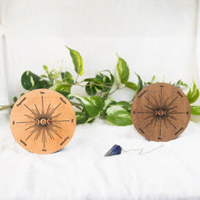 Load image into Gallery viewer, Wooden Triple Moon Pendulum Board with a pendulum displayed on a styled background - Down To Earth