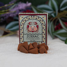 Load image into Gallery viewer, Zodiac incense cones with packaging on a textured surface with plants in the background - Down to Earth