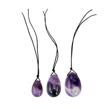 Load image into Gallery viewer, "Three pieces of amethyst yoni eggs. These items are used in Kegel exercises to strengthen the pelvic floor," - Down to Earth.