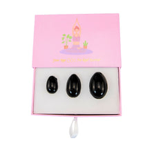Load image into Gallery viewer, "A three-piece yoni egg set in the crystal black obsidian. These items are used in Kegel exercises to strengthen the pelvic floor," - Down to Earth.